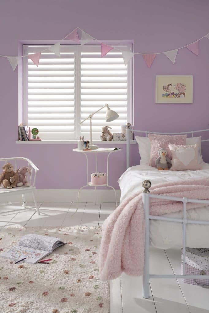 Full height shutters in girls bedroom